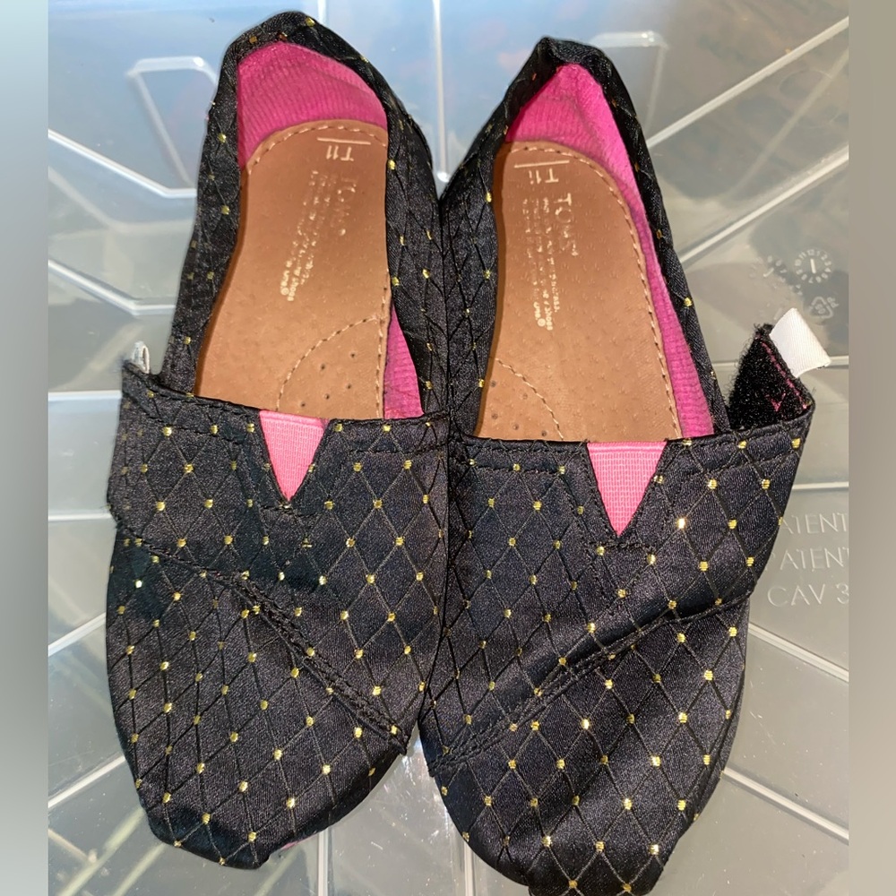 TOMS kids size 11. Black with gold dots.